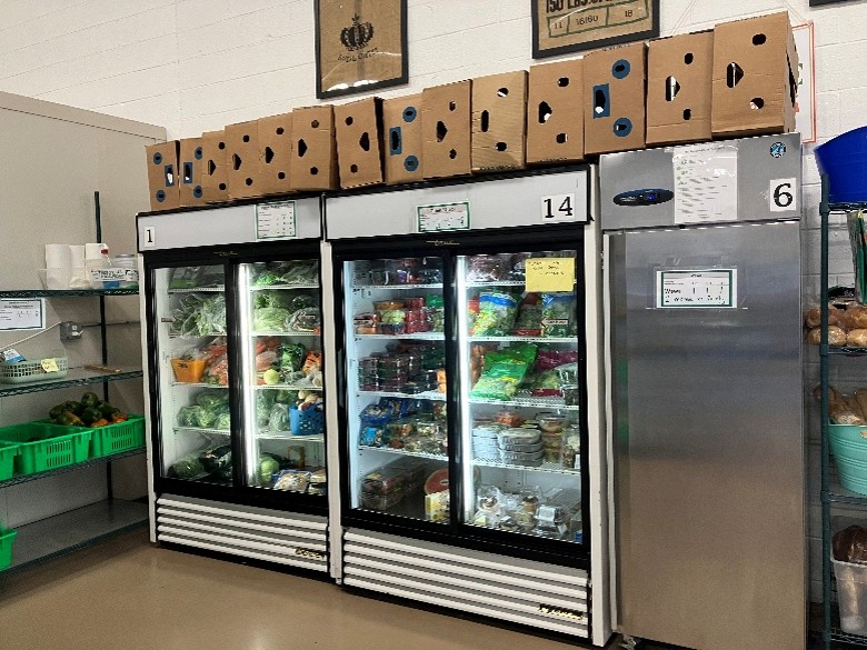 Refrigerators containing fruits and vegetables.
